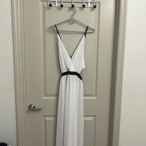 Express Size L, floor length flowy dress with lace up back & open sides. NWOT